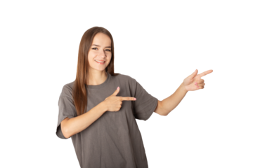 teenager smiling, young woman pointing at a place for text,person isolated, cute cheerful female student with long hair
