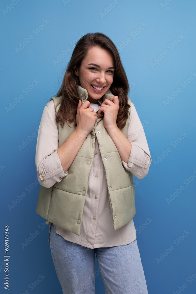 Sticker charming positive brunette young lady in casual style on studio background