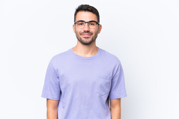 Obraz premium Young caucasian man isolated on white background laughing