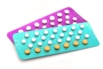 Colorful oral contraceptive pill strips.