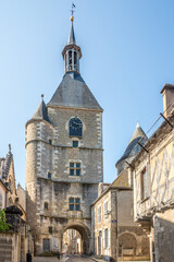 Fototapeta na wymiar View at the Clock tower in the streets of Avallon in France