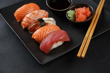 Japanese traditional Cuisine - Set of Nigiri sushi topped with  sake(Salmon), Maguro (Tuna), Unagi(Freshwater Eel)