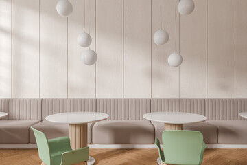 Light wooden cafe interior with sofa and row of tables