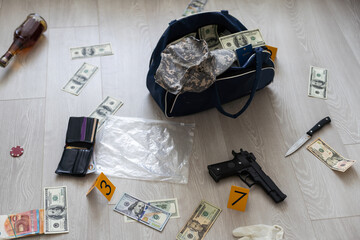 Handcuffs on many stacks of dollar bills. Metal suitcase with money, concept of arrest, investigation and fraud.