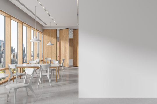 White and wooden office canteen interior with blank wall