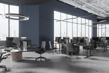 Blue open space office corner with round and rectangular tables
