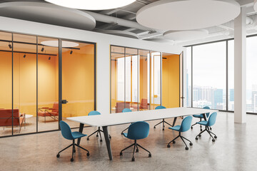 Colored conference room interior with desk, lounge zone and panoramic window