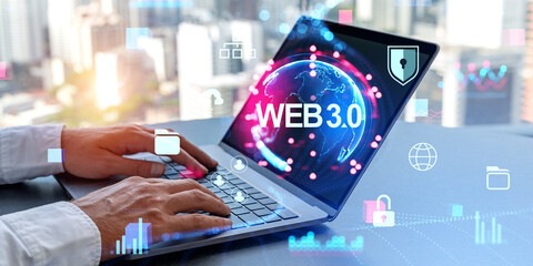 Man hands typing on laptop with web 3.0 hologram