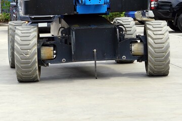 Close up of a heavy duty forklift truck in a parking lot