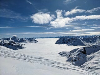 Fototapeta na wymiar Ski tour on the Flüela Schwarzhorn above Davos. Beautiful mountain panorama in winter. ski mountaineering. ski touring. High quality photo