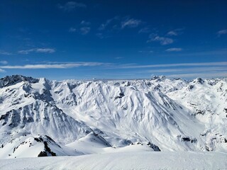 Ski tour on the Fl&uuml;ela Schwarzhorn above Davos. Beautiful mountain panorama in winter. ski mountaineering. ski touring. High quality photo