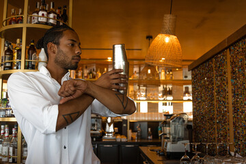 latin bartender practising cocktail movements