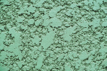 Arrière-plan mur en pierre craquelé texturé vert