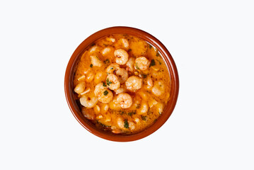 Clay dish with garlic prawns or also called Pil-pil, top view, white background.