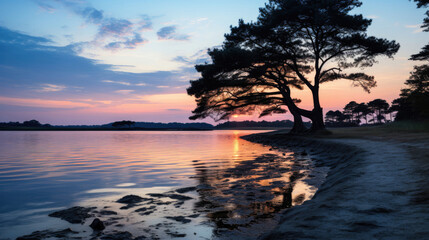 Fototapeta na wymiar A serene view of a coastal lagoon at dusk, the calm water reflecting the soft pastel hues of the twilight sky.