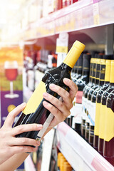Bottle of wine in hands