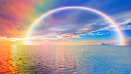 Beautiful landscape with turquoise sea with double sided rainbow at sunset - obrazy, fototapety, plakaty