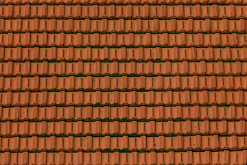 brown ceramic roof tiles close-up