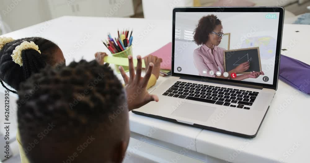 Poster African american siblings having class during laptop video call with female teacher in slow motion