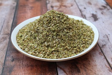 Dried oregano spice in a plate 