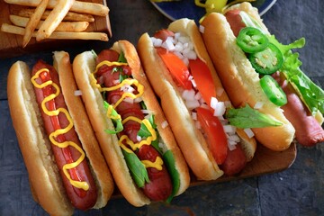 Savory Delight: Close-Up of a Delicious Hot Dog Served on a Wooden Platter, Satisfying Your Appetite in 4K Resolution