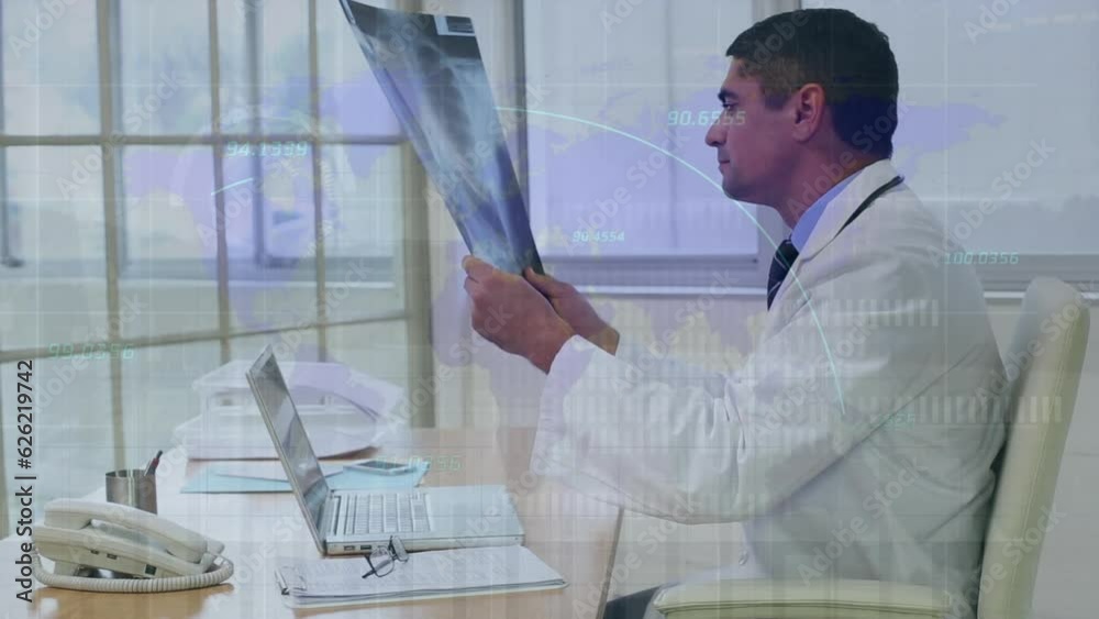 Canvas Prints Animation of statistical data processing on biracial male doctor examining x-ray report at hospital