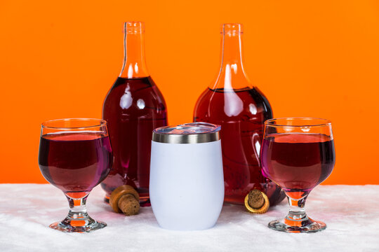 Immaculately presented mockup showcasing a white wine tumbler used for a minimalistic drink arrangement