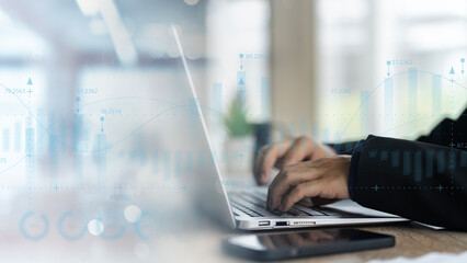 Financial Report Analysis: Business Man Utilizing Notebook Computer for Sales Assessment