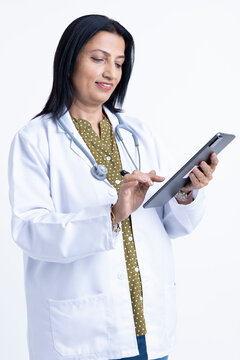 Senior female doctor with Digital Tablet.