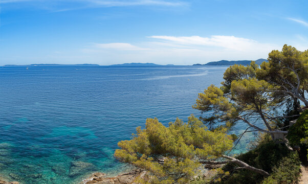 Mediterranean sea view from La Fossette point, clear waters, blue sky with few clouds, Le Lavandou, Azure Coast, France