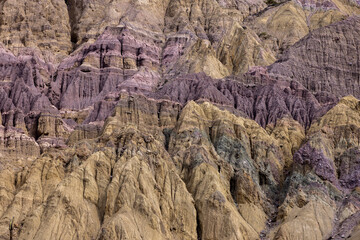 Close up of the colorful and jagged mountains near Purmamarca, Jujuy, Argentina - Traveling and exploring South America