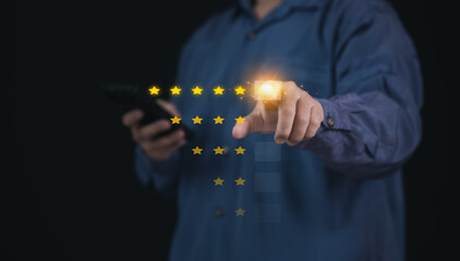 Businessman Selecting Five Star Satisfaction Rate on Virtual Screen on Mobile App for Positive Feedback : Modern Success in Digital Communication or Complacent Achieving Excellence in User Experience