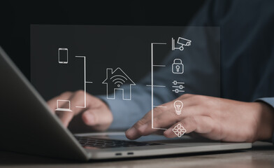 Concept smart home technology : businessman touching or pressing the virtual screen for Remotely control home appliances using the internet system and AI.	