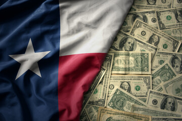 colorful waving national flag of texas state on a american dollar money background. finance concept