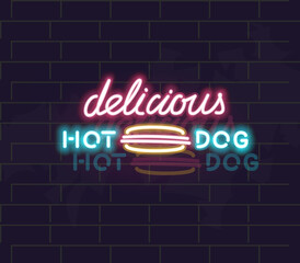 Obraz premium Neon delicious hot dog icon. Typography with food silhouette on brick wall background.