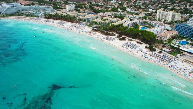 Aerial view of Sa Coma beach in Mallorca Spain on a summer day