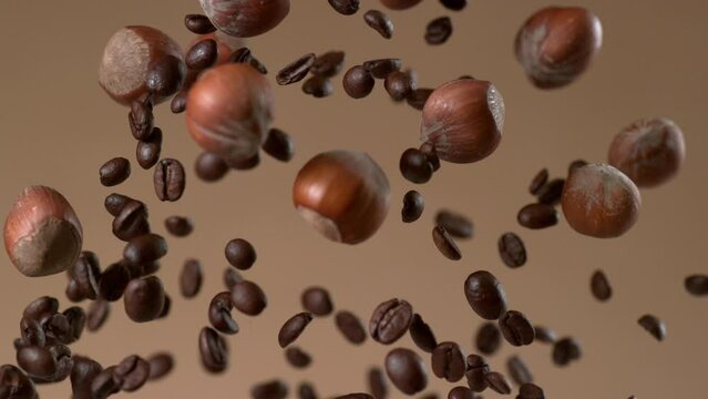 Coffee and hazelnuts falling in slow motion