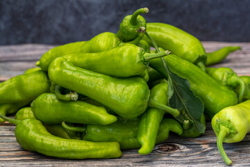 Green Peppers on a wooden table