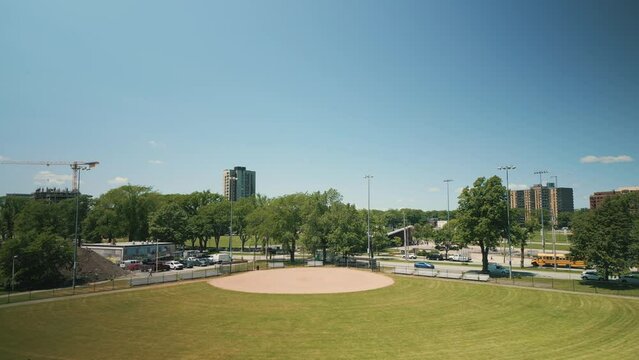 Aerial View of Green Baseball Field, Baseball Diamond, Sports Field, Public Park in Halifax, Canada. Drone Shot at an Empty Baseball Field Downtown.