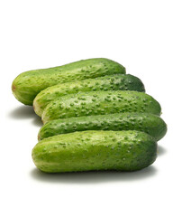 Fresh cucumbers isolated on white. High quality photo with shadows