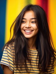 Naklejka premium Asian Girls' Education. Happy beautiful Asian Girl is smilling on color background. Generative AI