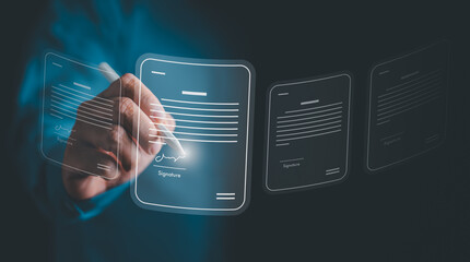 Electronic signature and paperless for office concept. Businessman sign electronic documents in a...
