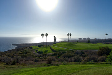 Obraz na płótnie Canvas Golf course on Tenerife in the background Playa Paradiso 