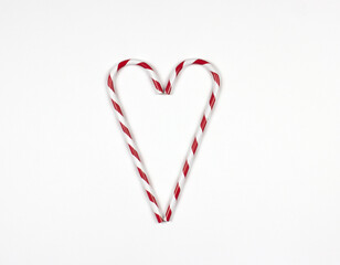New Year flat lay with decorative candy heart. Free copy space for your text. Decorative object top view.