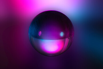 Cute and happy 3D face of the Artificial Intelligence assistant bot on a blurred pink and blue...