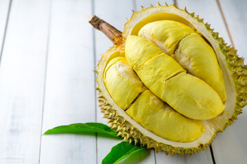Durian fruit. Ripe monthong durian on white wood background, king of fruit from Thailand on summer season