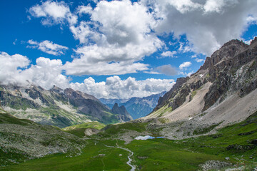 Fototapeta na wymiar Trekking in Alta Valle Maira. Da Chiappera al Colle del Maurin ai piedi della Rocca Provenzale