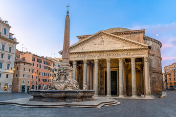The Roman Pantheon at sunrise with an Egyptian obelisk in the foreground, and pink and blue sky...