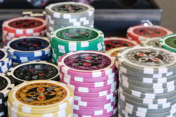 Poker chips piled up on table