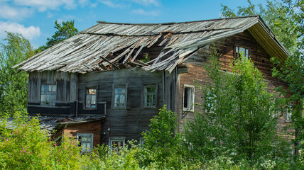 two-story wooden house with broken windows and collapsed roof, backgrounds